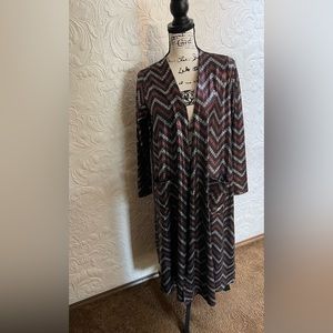 Metallic Duster for special occasions and Holidays. Two front pockets.